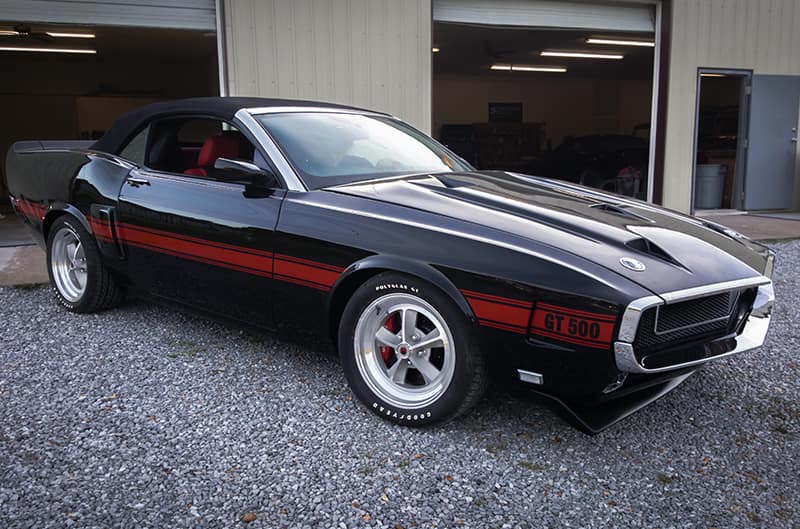 Black GT500 retro build outside of duncan bros shop