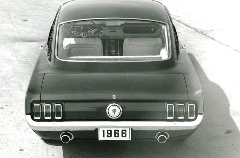 rear image of 1966 Mustang in black and white