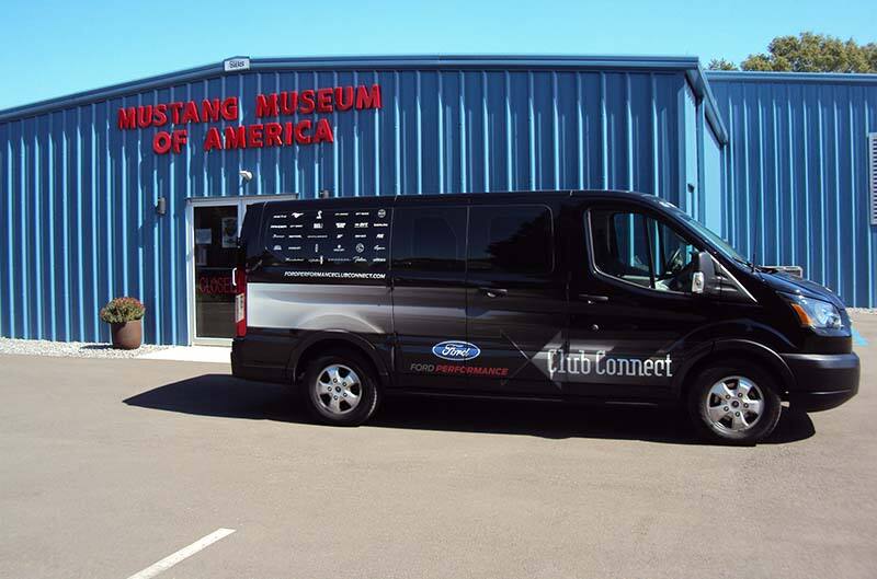 Black Ford transit infront of Museum