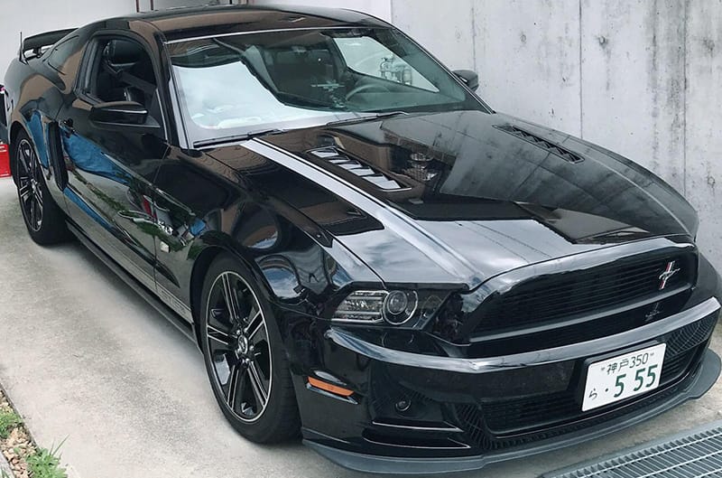 Tight photo of Black GT CS Mustang