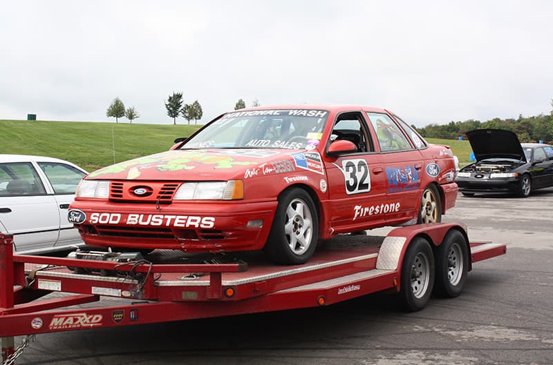 Red SHO on trailer with stickers