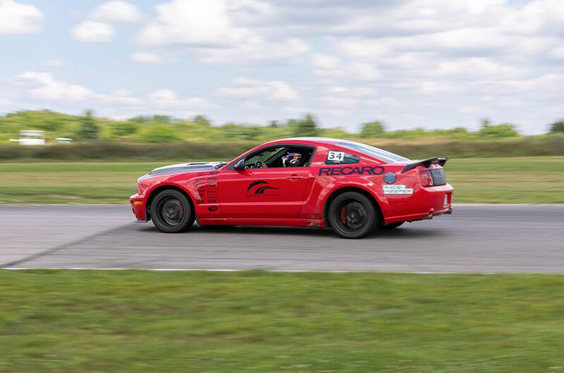 Red Mustang S197 on track