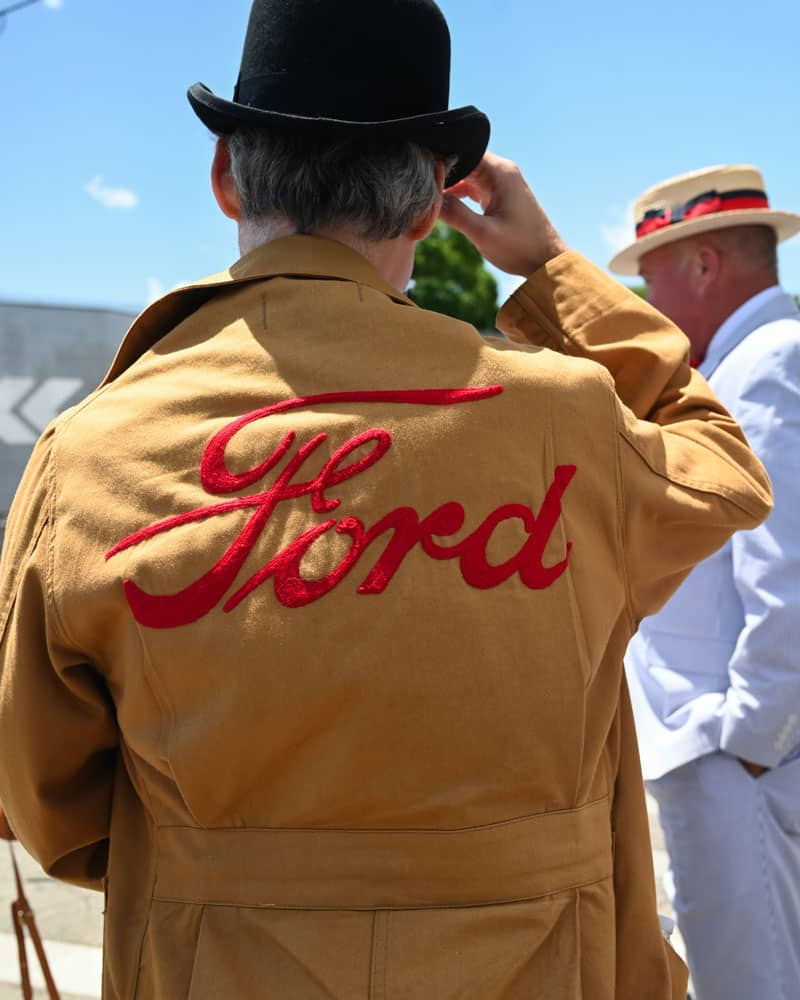 man with a orange and red Ford jacket