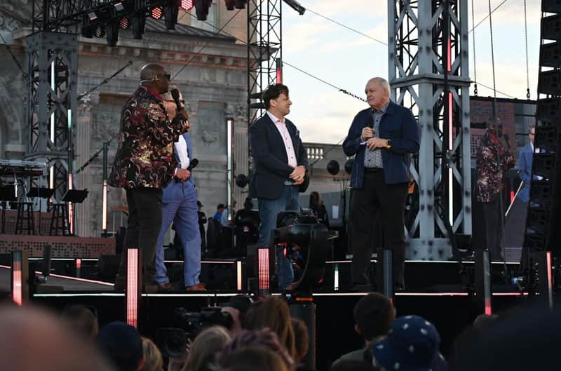 Jim Farley speaking to crowd on stage