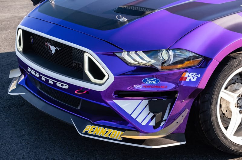 A closeup look of DeNofa's new purple Mustang RTR front grille