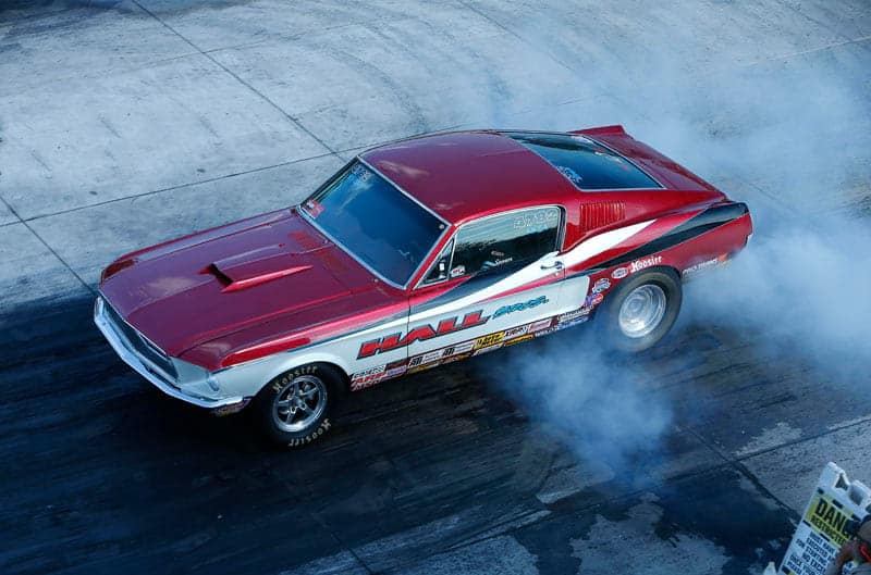 Steve Hall's vintage red and white 1968 NHRA Stock Eliminator Mustang