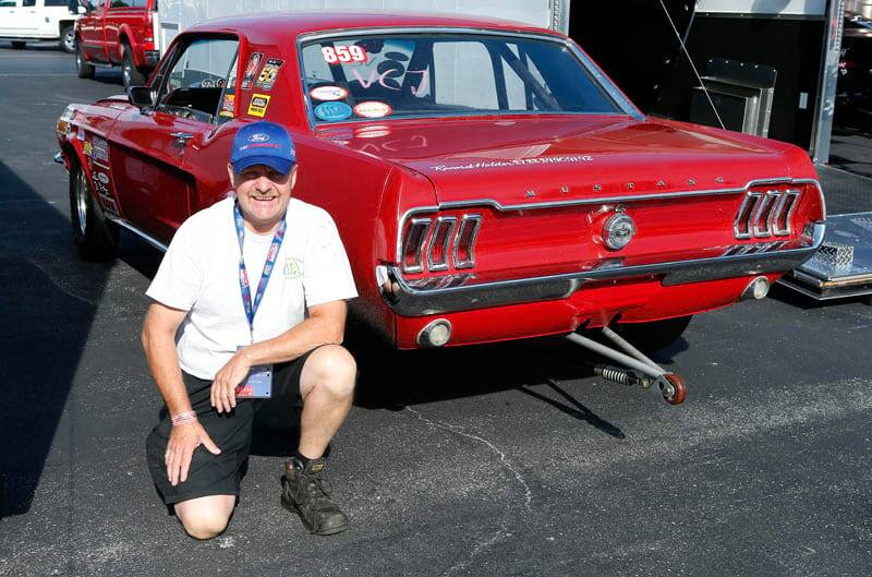 Car owner with red Cobra Jet