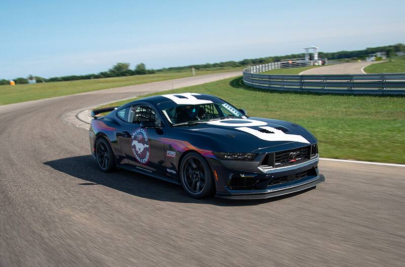 2024 Mustang Dark Horse R on Track pulling through corner