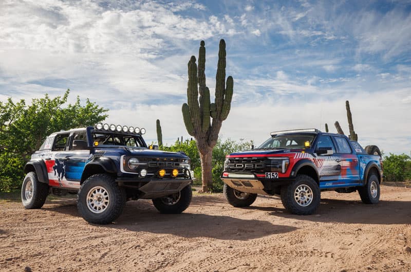 Bronco Raptor and F150 Raptor in desert