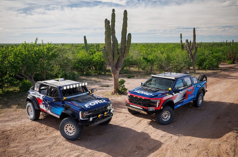 Bronco Raptor and F150 Raptor in desert