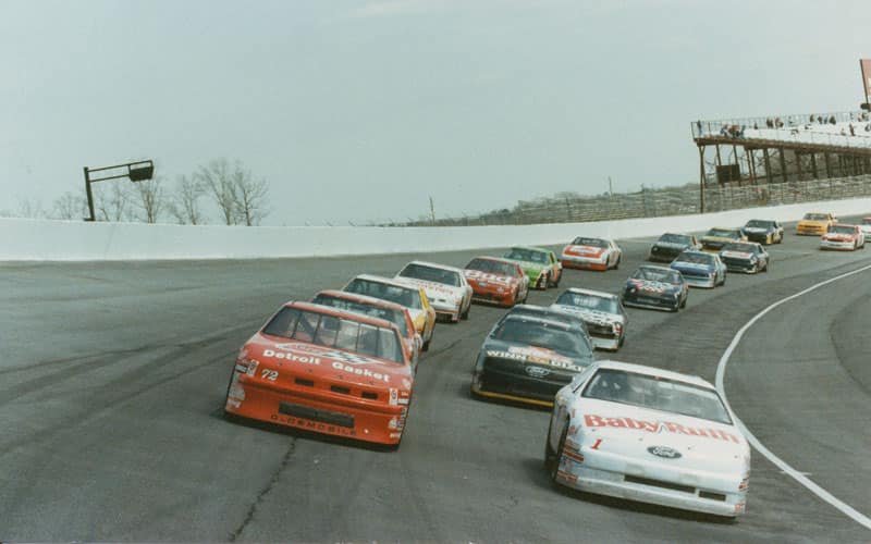Gordon's iconic Number 1 Baby Ruth Thunderbird is pictured leading in front of the race at a track in 1992