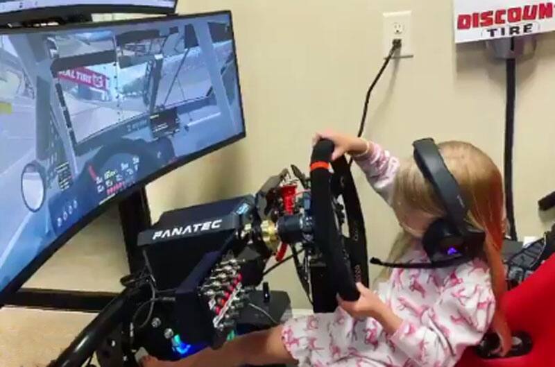 Brad Keselowski's daughter using the racing simulator