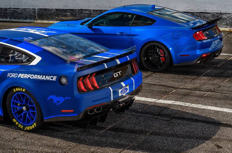 Close up back profile of the production and stock Next Gen Mustang on the track.