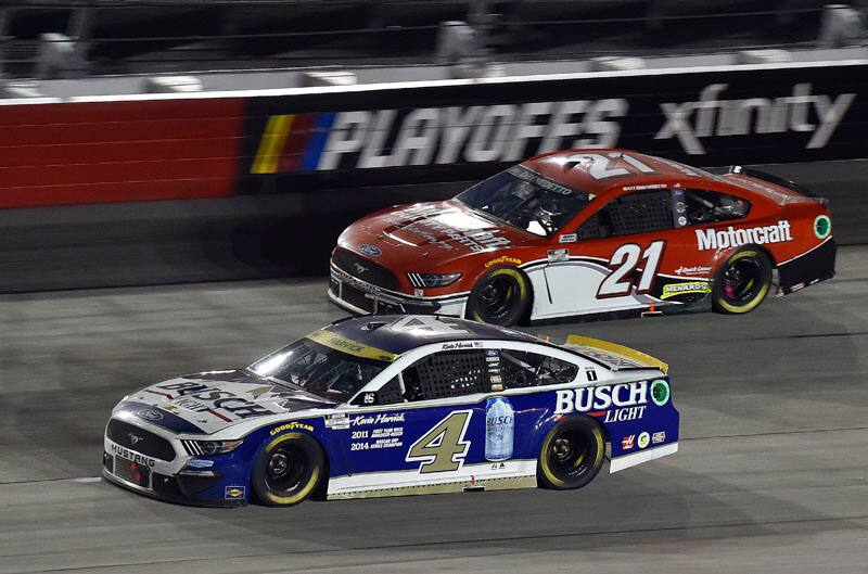 Harvick and DiBenedetto Mustangs lead on the track