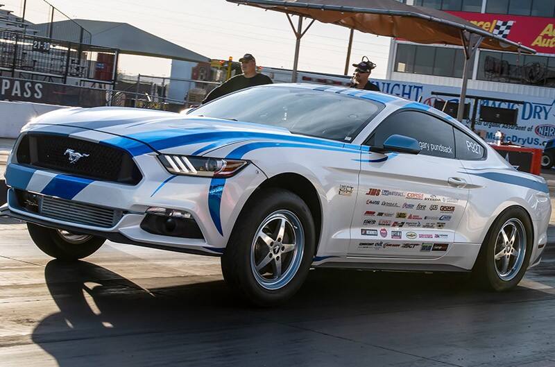 2017 Mustang on drag strip with front wheels up