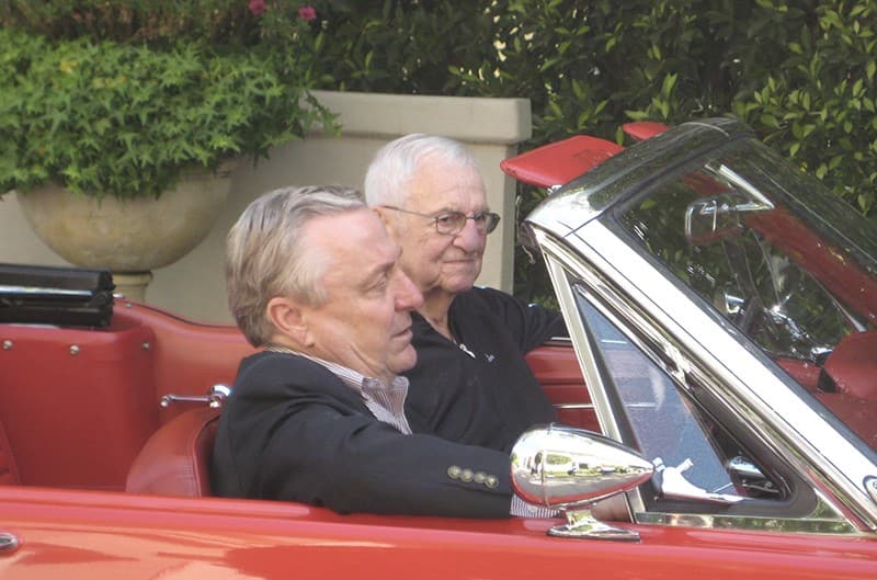Lee Iacocca and guest in Ford Mustang