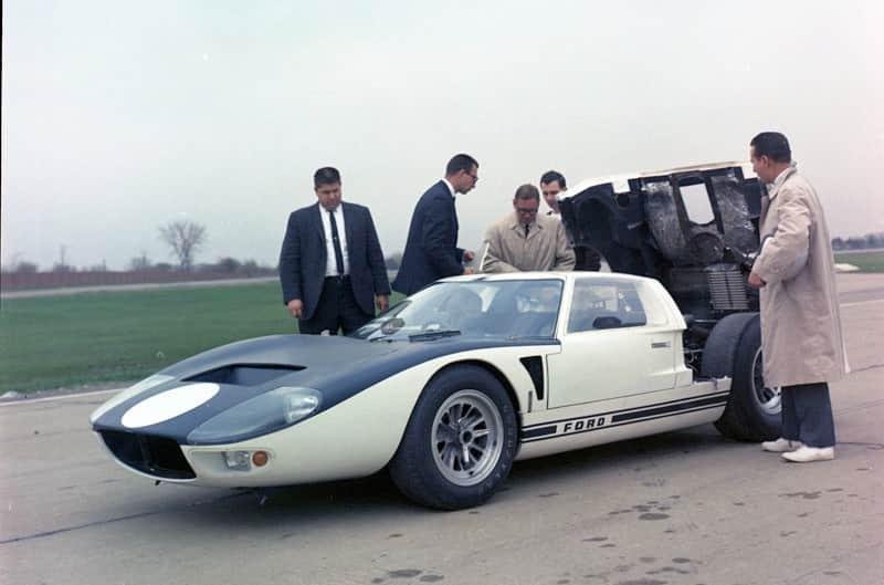 Multiple people working on a GT40X in 1965 