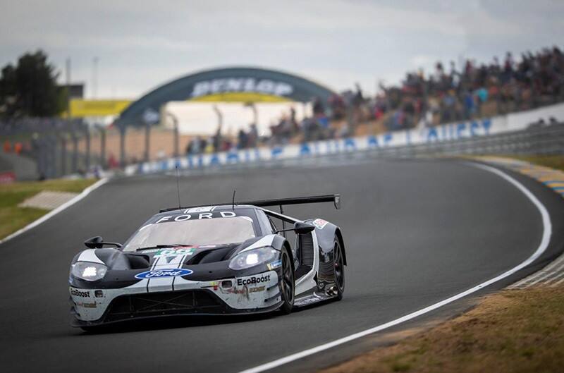 Black and white Ford GT racecar on track