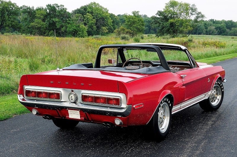 Rear view of 1968 red Shelby GT500KR on road