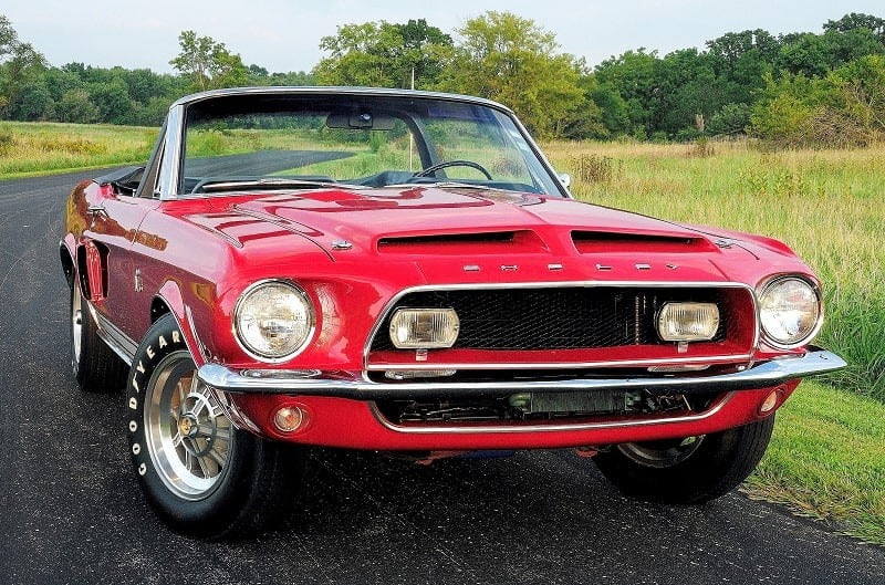 Front view of 1968 red Shelby GT500KR on road