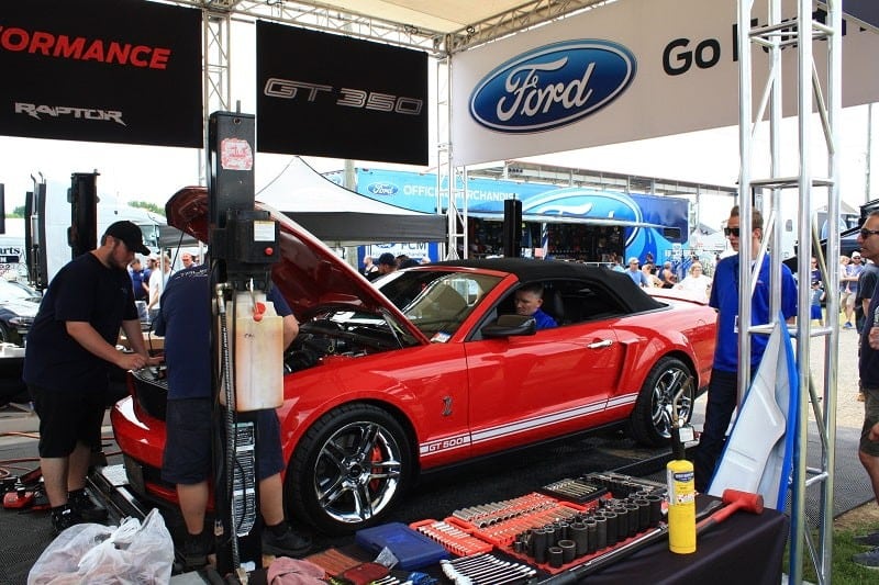 Red GT350 on display with hood up 