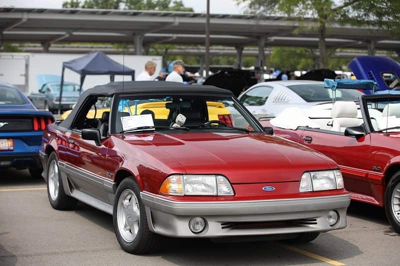 Front view of red Mustang drop top