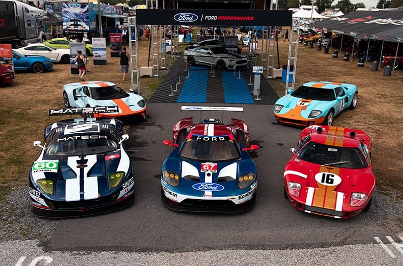 Various Ford GTs parked in front of a Ford Performance tent at Carlisle Ford Nationals 