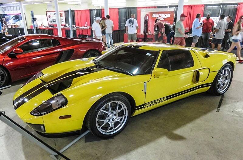 A yellow and black Ford GT at Barrett Jackson 