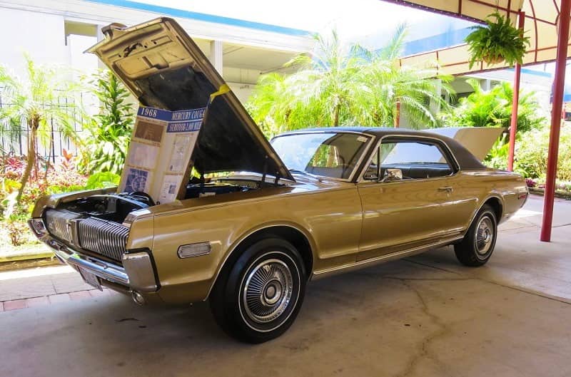 A brown Ford Mustang on display at the auction