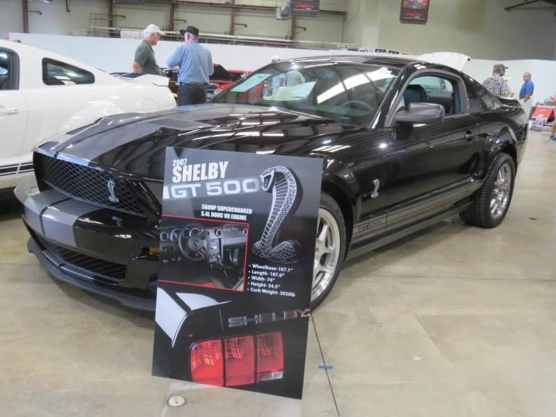 A black Shelby GT500 on display at the auction 