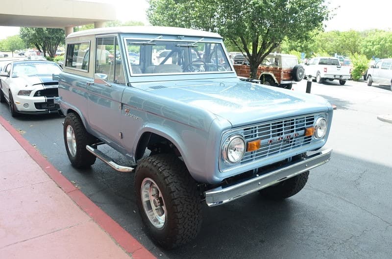A light blue Ford Bronco on display at the Ford and Shelby Nationals 