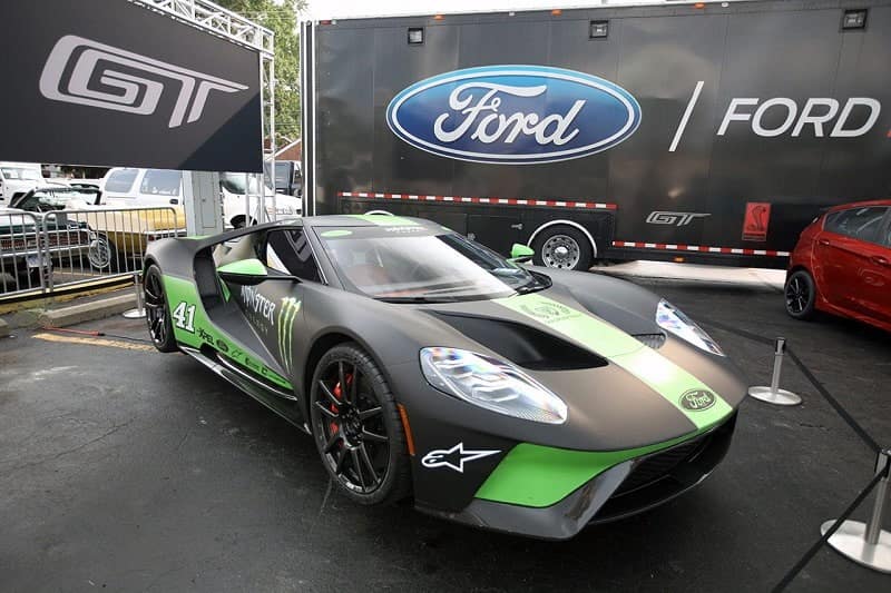 A black and green Ford GT on display 