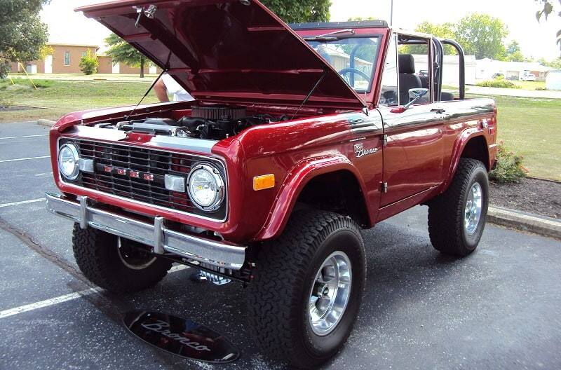 A classic red Ford Bronco on display 