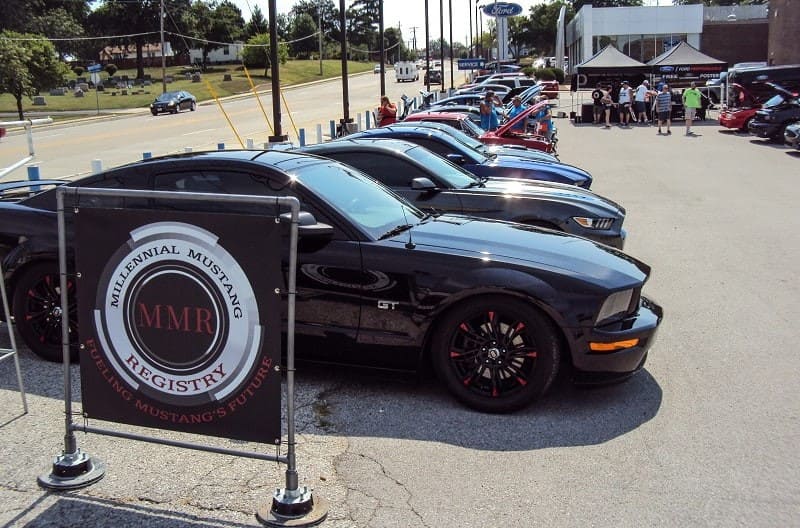 A lineup of Ford Mustangs on display 