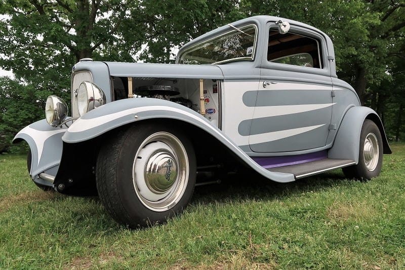 A classic hot rod on display at the car show 