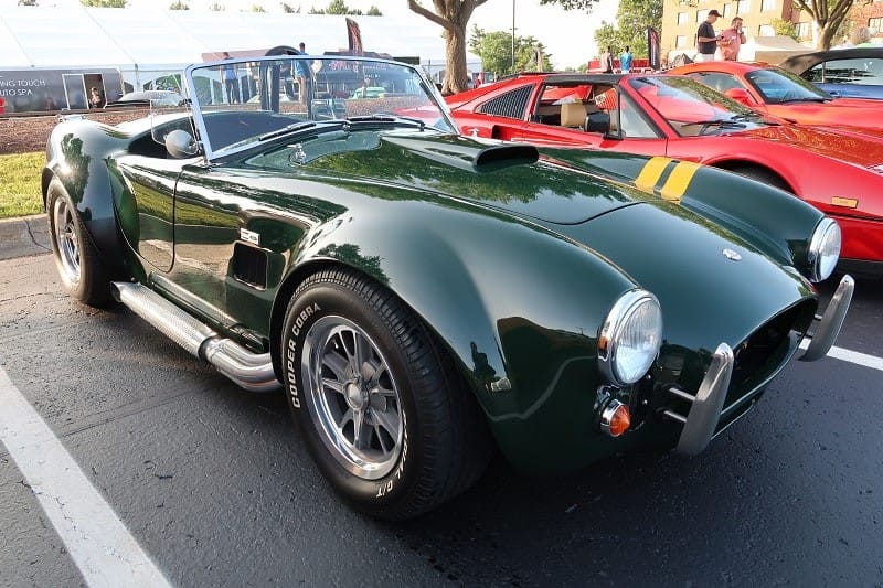 A classic green Shelby Cobra on display 