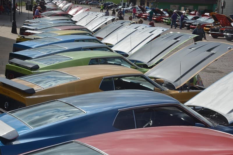 A lineup of classic vehicles at Boss Motors in Kansas 