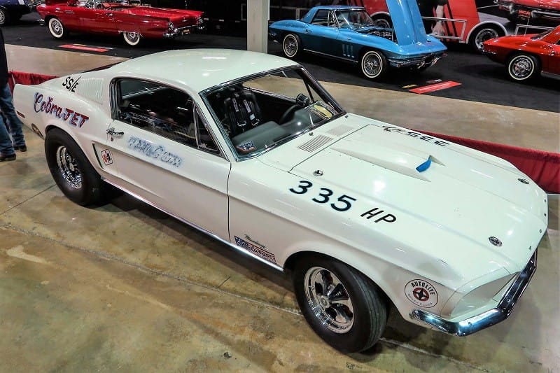 A front side view of a classic white Cobra Jet