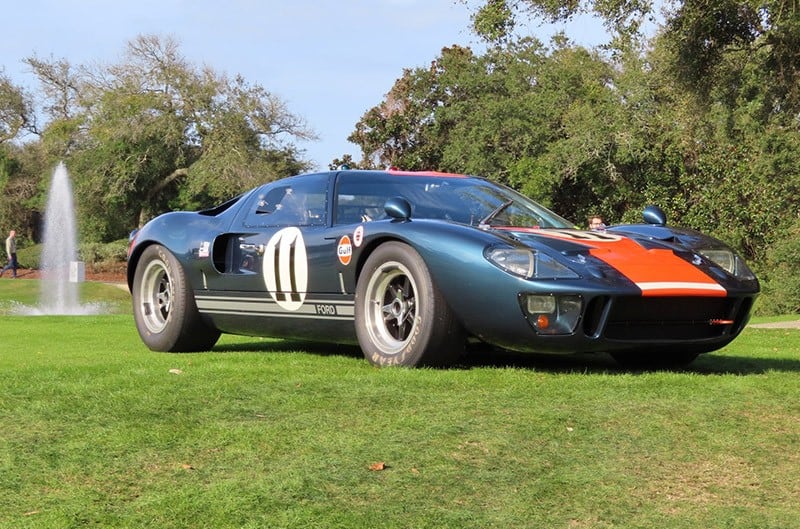 A front side view of a Ford GT on display with the number 11 on the side