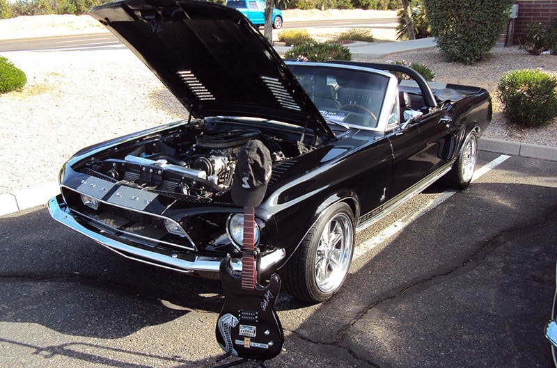 Black Shelby Mustang with Guitar