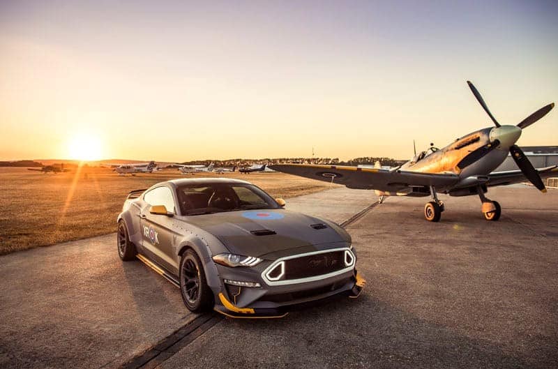 Both the Ford Eagle Squadron Mustang GT and an Eagle Squadron Spitfire parked at a regional airport