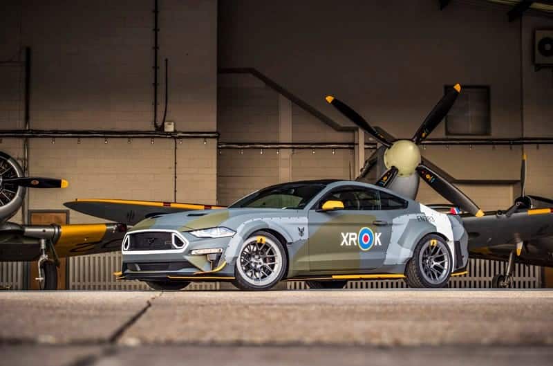 Another view of the Ford Eagle Squadron Mustang GT inside a garage with an Eagle Squadron Spitfire