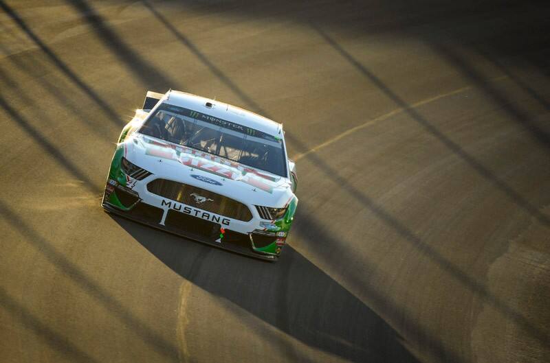 Harvick charging through a corner on the track