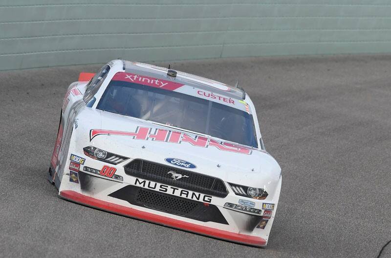 Cole Custer accelerating around a corner at Homestead