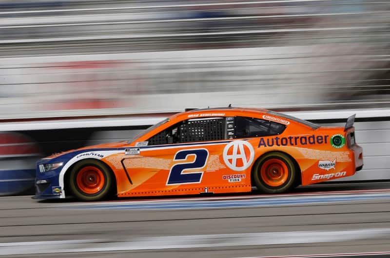 Brad Keselowski's number two Ford Mustang Autotrader car racing on track